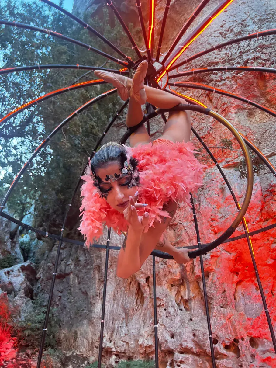 Aerial hoop performer at a SevenPees event